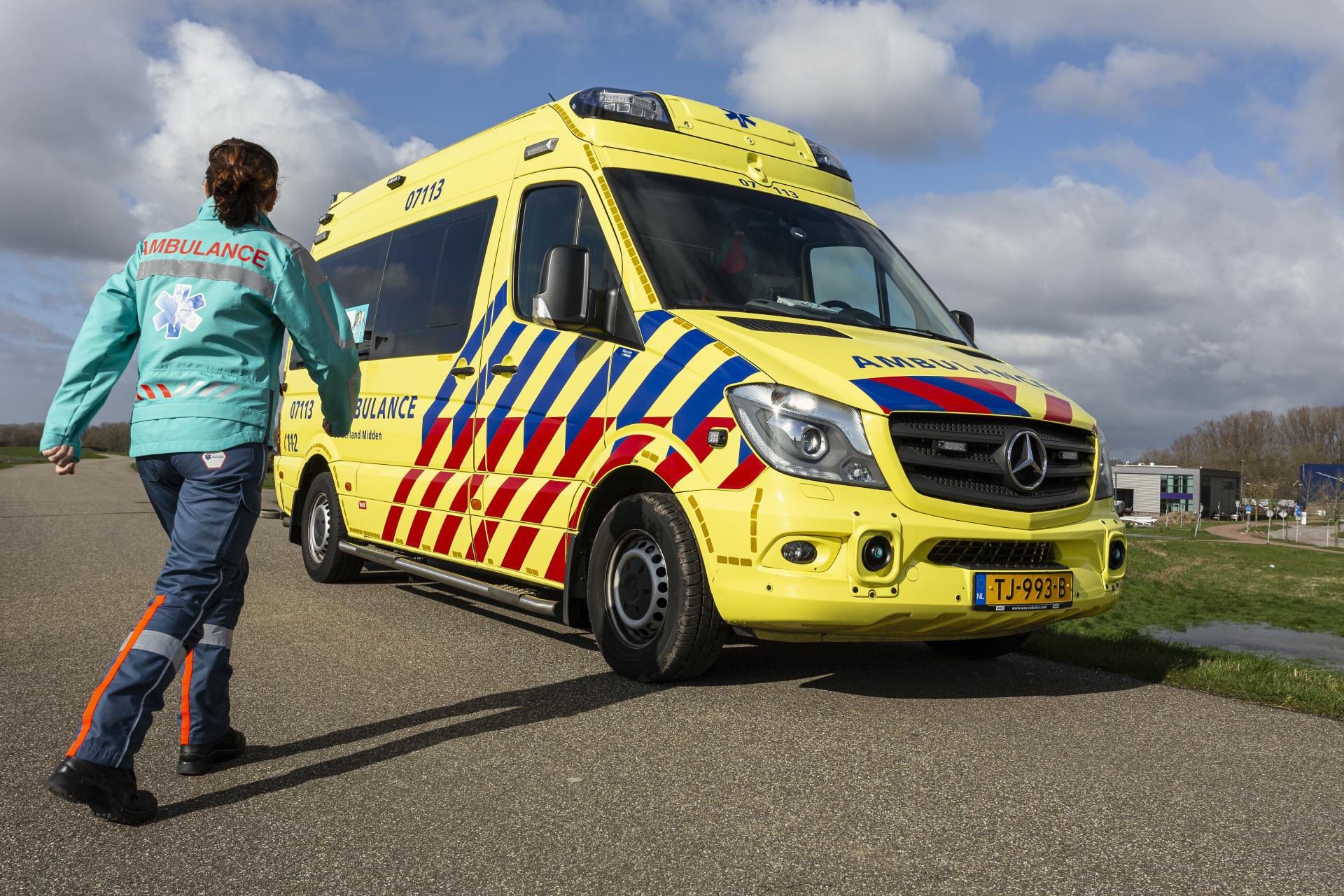 Medewerker met Ambulance